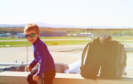 little boy in the airport, kids travel conceptの写真素材