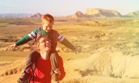father and son travel in scenic mountains, family travelの写真素材