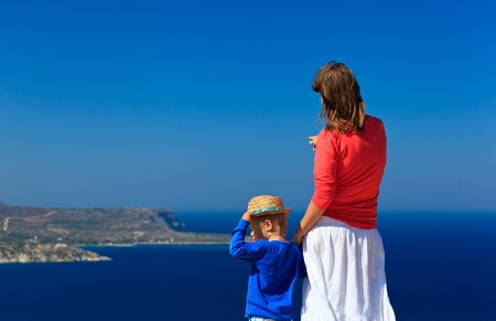 mother and little son travel at the sea, family vacationの写真素材