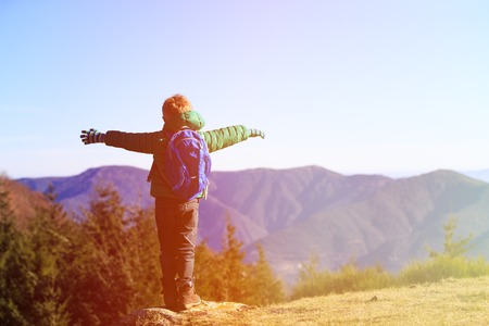 little boy with backpack travel in mountains, kids travelの写真素材