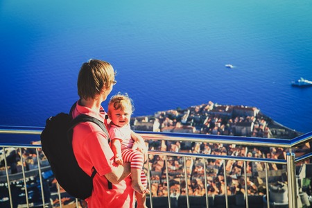 father and little daughter travel in Dubrovnik, Croatia, family travelの写真素材
