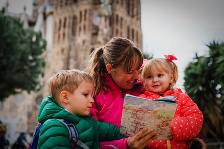 Family travel - mother with two kids travel in Barcelona, Spainの写真素材