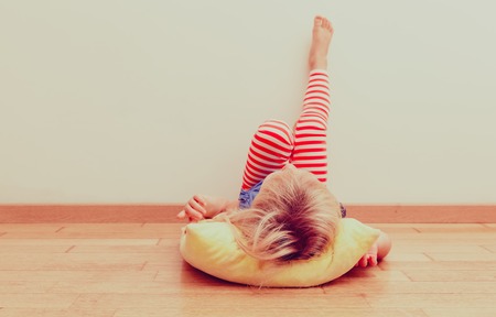 little girl relax at home, home laziness and comfortの写真素材