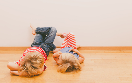 little boy and girl relax at home, home comfortの写真素材