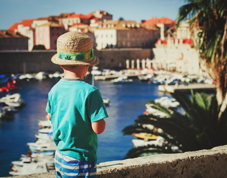 little boy looking at Dubrovnik, Croatiaの写真素材