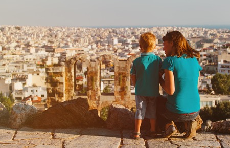 mother and son looking at the city of Athens, Greece from Acropolisの写真素材