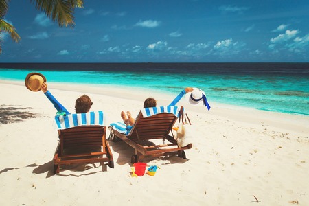 happy couple relax on a tropical beachの写真素材