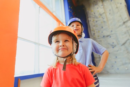 little girl and boy learn sport climbingの写真素材