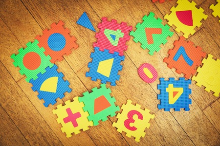 kids number and shapes puzzle in playroomの写真素材