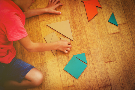 little boy playing with puzzle, education conceptの写真素材