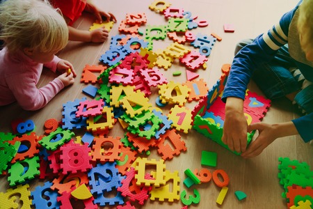 kids playing with puzzle, learning conceptの写真素材