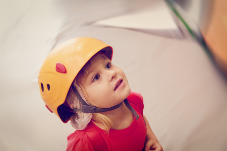 little girl climbing in sport centerの写真素材