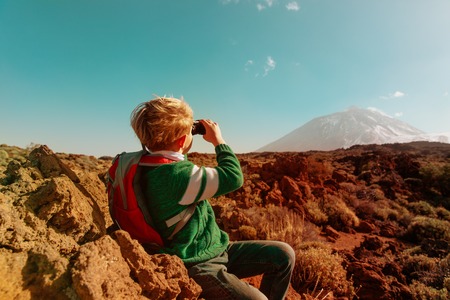 little boy travel in mountainsの写真素材