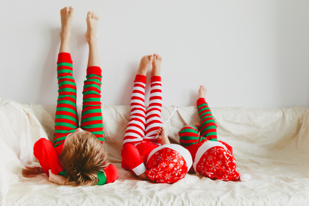 joyful kids waiting for Christmas at homeの写真素材