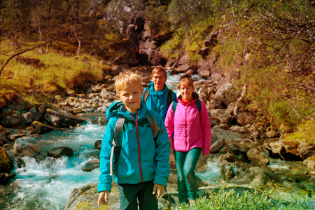 family with small kid travel hiking in nature of Norwayの写真素材