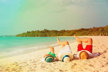 happy family with child relax having fun on beachの写真素材