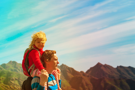 Father and little daughter travel in mountainsの写真素材