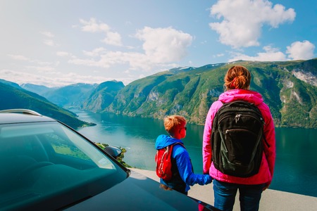 family travel by car-mother with son travel in mountainsの写真素材