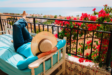 young woman relax on scenic balcony terraceの写真素材