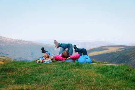 family- mother and kids relax in mountains, nature travelの写真素材