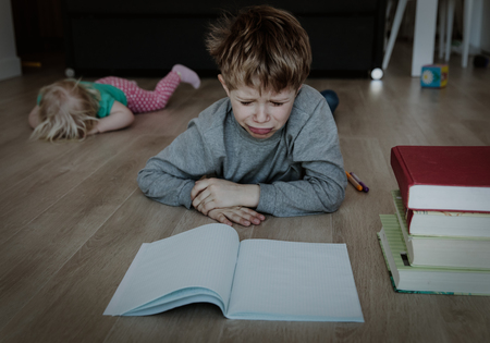 difficult homeschooling- boy tired of homework, sister crying