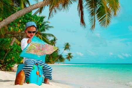 little boy travel on tropical beach vacationの写真素材