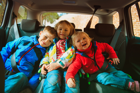 happy kids travel by car, family adventure, vacation conceptの写真素材