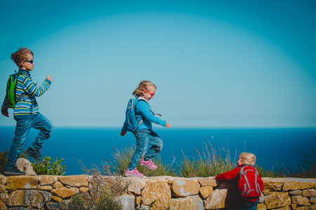 kids travel hiking in nature, have fun on family vacationの写真素材