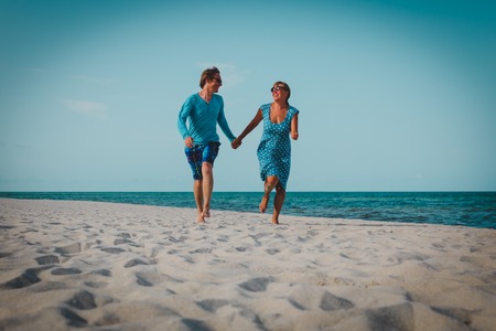 happy loving couple enjoy tropical beach vacationの写真素材