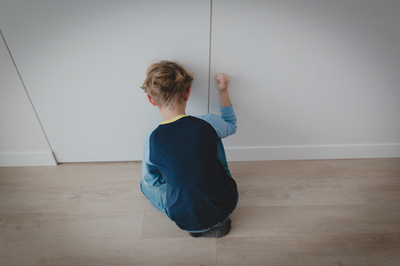 agressive exhausted child, stress and depression, autismの写真素材