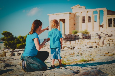mother and son travel in Greece, looking at ancient buildingsの写真素材