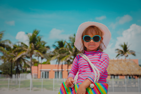 cute little girl at summer beach vacationの写真素材