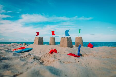 Sand castle on beach vacation and toysの写真素材