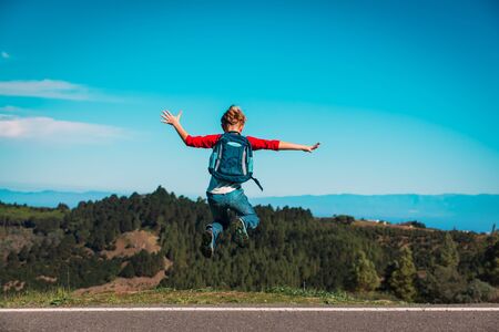 family travel - happy child enjoy hiking in nature