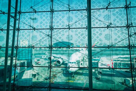 DUBAI, UAE - July 30: Emirates Airbus A380 at Dubai Airport on July 30, 2017 in Dubai, UAE. Emirates handles major part of passenger traffic and aircraft movements at the airport.のeditorial素材