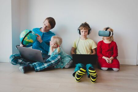 family on distant learning at home, online education for kidsの写真素材