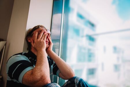 man depression from staying at homeの写真素材