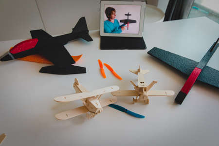 building plane models with online video lesson, remote engineering class for kids