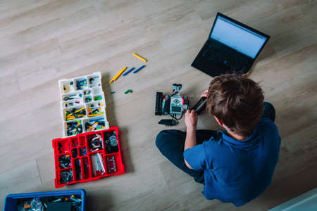 boy building robot at home, STEM for kidsの写真素材