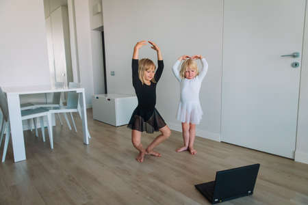 Ballet or gymastics lesson online. Remote learning for kids.の写真素材