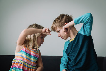 brother and sister rivalry, dispute, anger, disagreementの写真素材