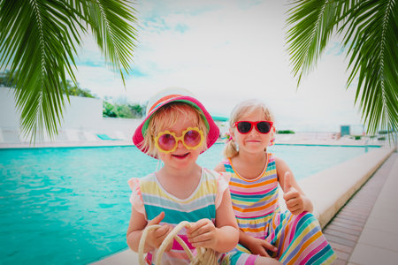 kids relax on tropical beach resort, family vacationの写真素材
