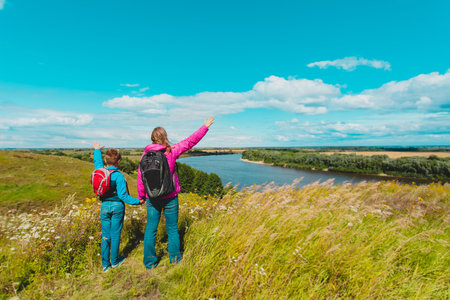 mother and son enjoy travel in nature, family hikingの写真素材