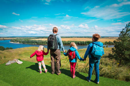 family looking at scenic nature, father and kids travel in natureの写真素材