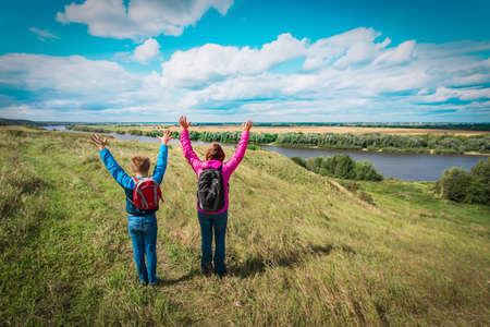 mother and son enjoy travel in nature, family hikingの写真素材