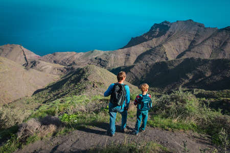 father and son travel in nature, family hikingの写真素材