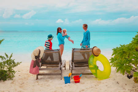 happy family with kids on beach vacationの写真素材