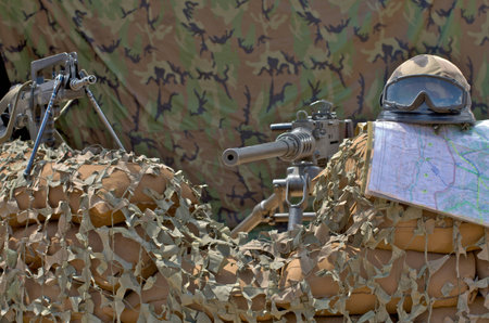 machine gun, famas, helmet and mapの写真素材