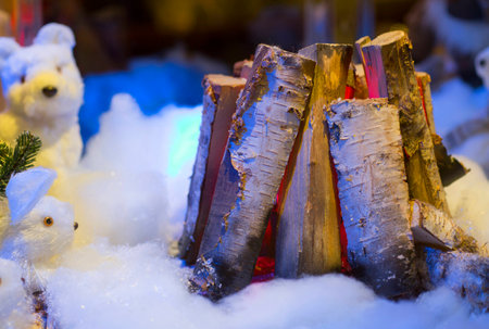 Christmas decorations, wood for the fire. Sticks for a fire on the snow among the bears.の写真素材