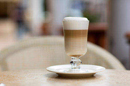 Coffee Latte in a glass on the table. Hot coffee with milk, Latte.の写真素材
